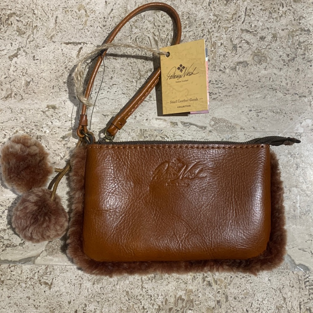 NWT Patricia Nash laser cut Sherpa leather wristlet